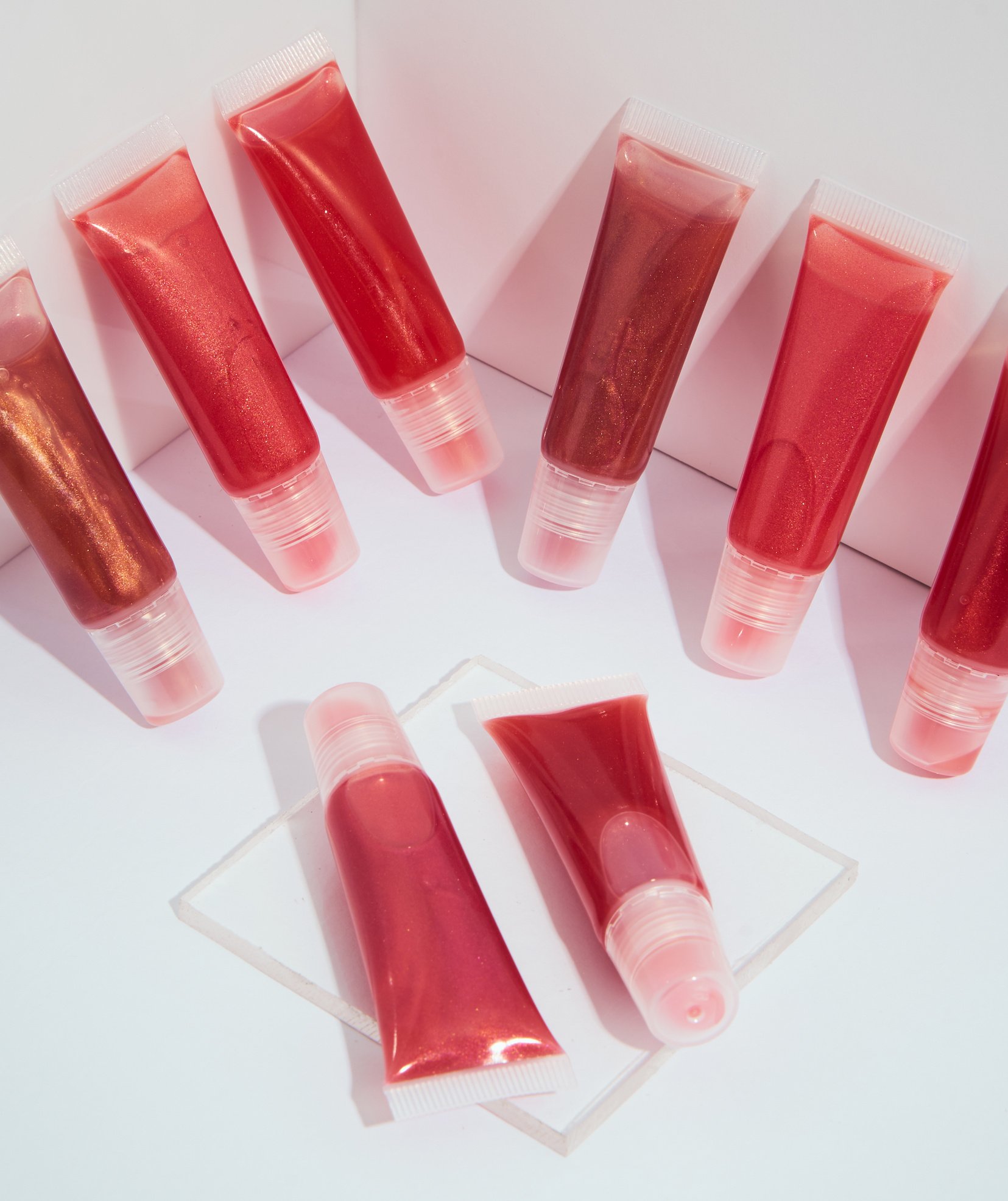 Lip Glosses on White Background